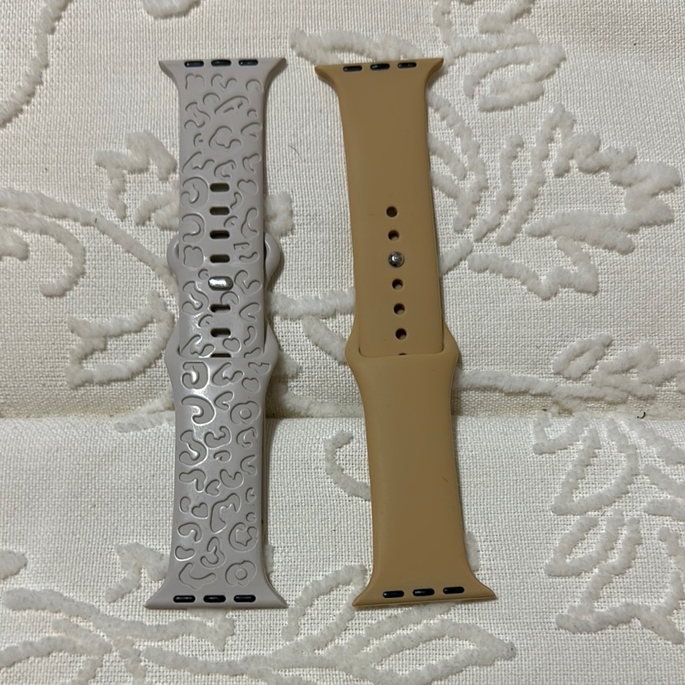 Stylish starlight and Tan Apple Watch straps